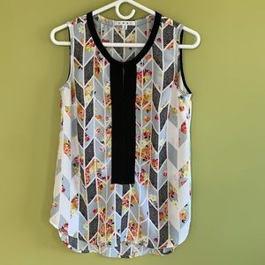 CAbi dogwood floral print top with black grosgrain ribbon detail.